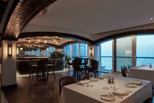 Upscale waterfront banquet hall at Meyana Auditorium for corporate mixers and formal events.