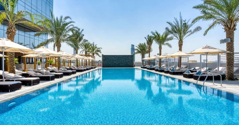 Poolside cafe at Jumeirah Village Circle hotel for executive retreats and incentive travel events.
