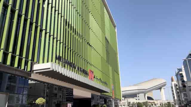 Modern Millennium Al Barsha hotel facade, eco-friendly venue for corporate incentive travel.