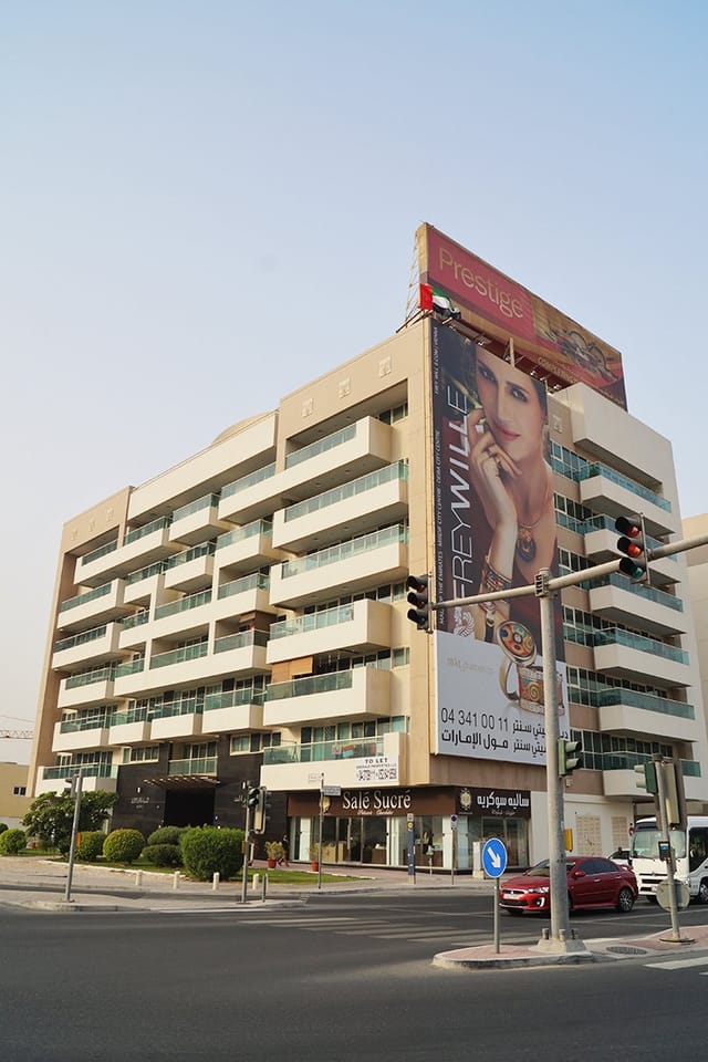 Emerald at Millennium Al Barsha commercial building exterior for retail and business event venues.