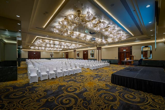 Al Garhoud Ballroom theater setup with stage for corporate events and keynote conferences.
