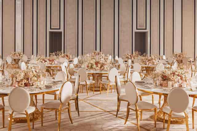 Luxury gala ballroom setup with gold accents, ideal for corporate dinners and upscale events.