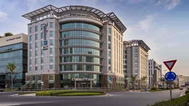 Modern Radisson Blu Dubai Media City conference room for corporate events and professional meetings.