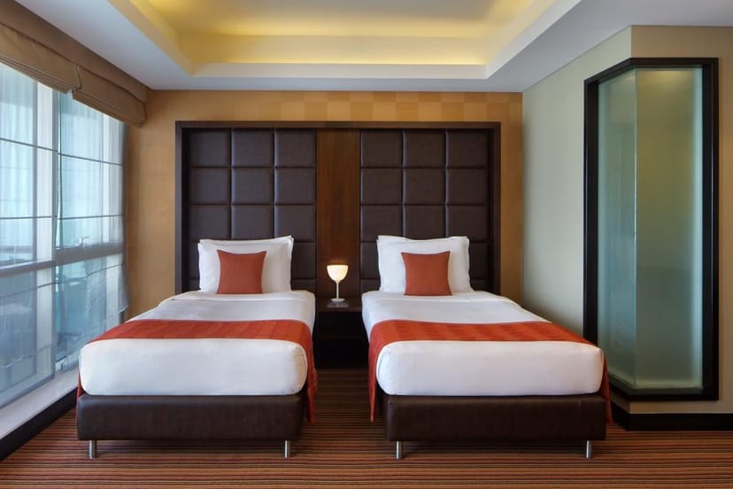 Modern twin-occupancy conference room at Radisson Blu Dubai Media City for business meetings.