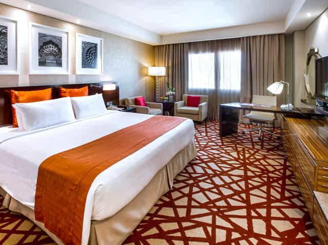 Al Gazelle hotel room at Crowne Plaza Dubai for business conferences and corporate retreats.