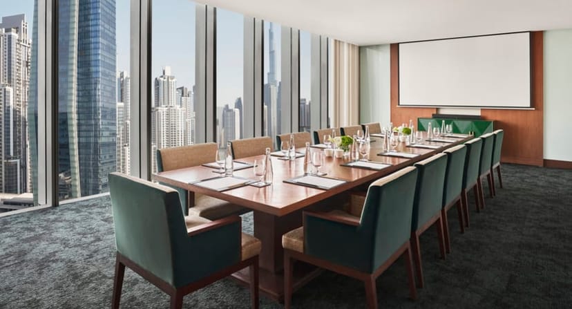 Executive boardroom with urban view at Anantara Downtown Dubai for corporate meetings and events.
