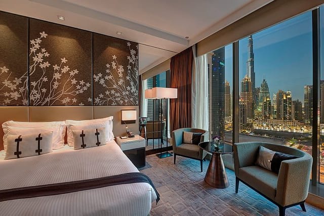 Pullman Dubai Downtown hotel room with iconic skyline view for executive and VIP events.