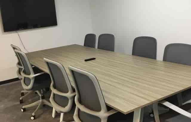 Czar Workspace breakout room featuring visible AV cabling for office huddles and focused meetings.