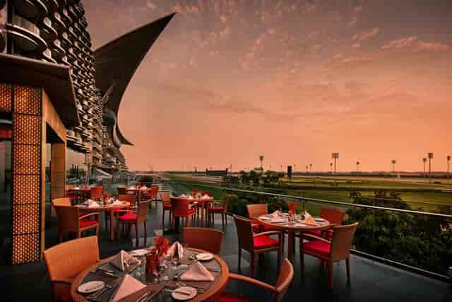 Meydan Hotel suite with iconic backdrop for premium incentive travel and outdoor dining events.