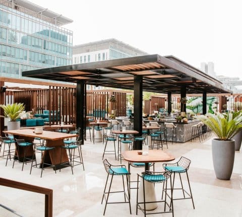 Modern rooftop venue with bar for corporate cocktail hour and networking events.