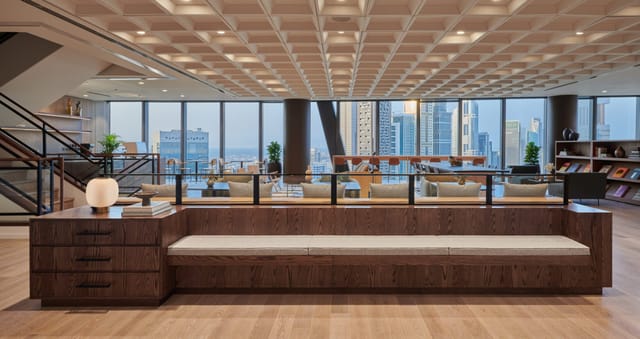 Sky Suites networking space with floor-to-ceiling windows for corporate events and workshops.