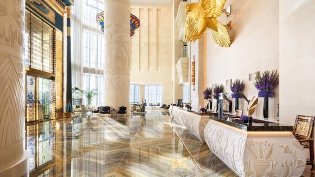 Luxury Egyptian-themed hotel lobby for grand corporate events and hotel registration.