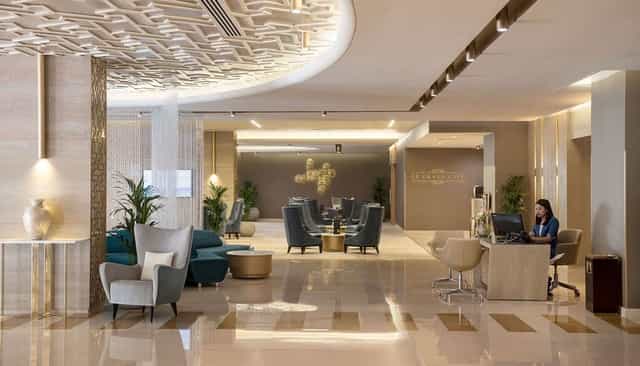 Two Seasons Hotel lobby with polished decor, ideal for VIP business events and networking.