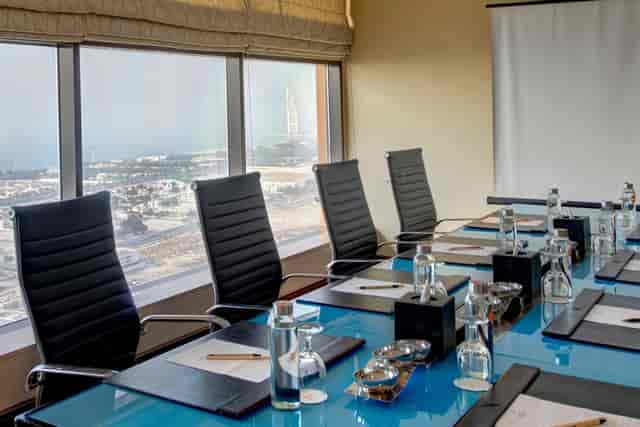 Boardroom at Two Seasons Hotel with Burj Al Arab view, perfect for corporate meetings and events.