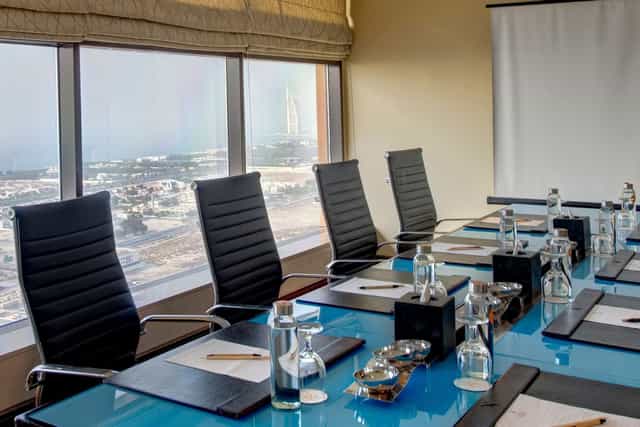 Boardroom at Two Seasons Hotel with Burj Al Arab view, perfect for corporate meetings and events.