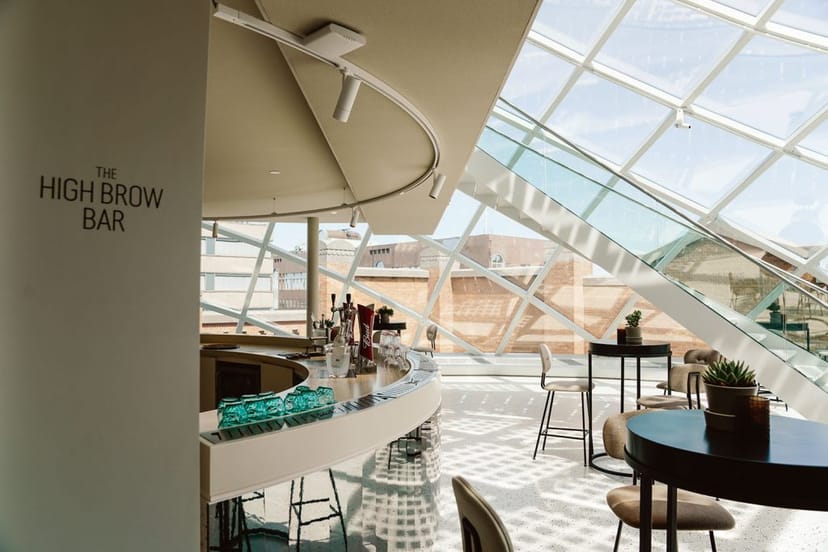Modern bar area in upscale Amsterdam restaurant, ideal for meetings and events.