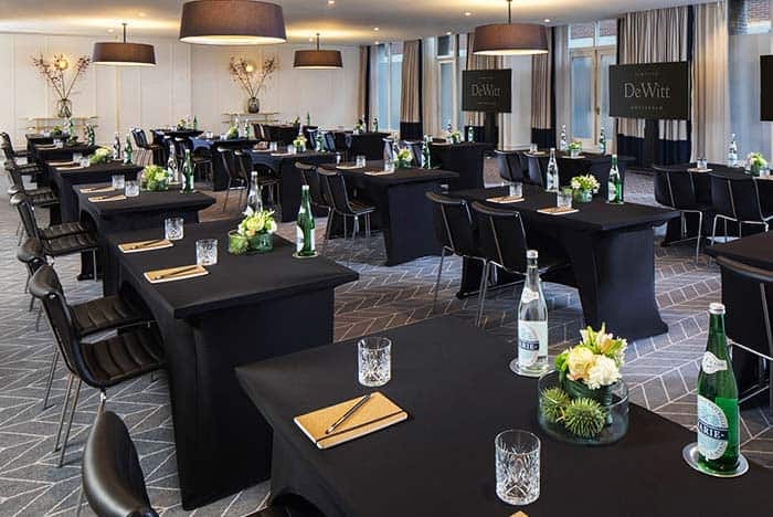 Sophisticated meeting room at Kimpton De Witt for corporate events, elegant decor.