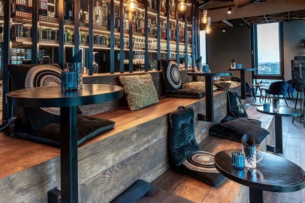 Private dining room at Four Elements Hotel Amsterdam, ideal for networking events and meetings.