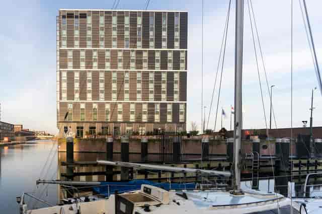 Modern waterfront venue at Four Elements Hotel Amsterdam for corporate events.