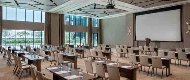 Menara Ballroom at DoubleTree Dubai, elegant conference room with natural light for events.