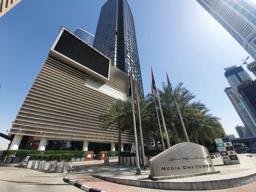 Media One Tower office space with outdoor branding for corporate events and business conferences.