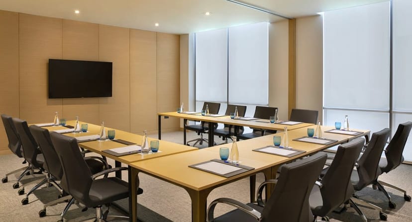 U-shaped boardroom at Avani Ibn Battuta Dubai Hotel for executive meetings and workshops.
