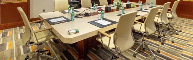 Boardroom meeting room at Crowne Plaza Dubai Jumeirah for corporate conferences and business events.