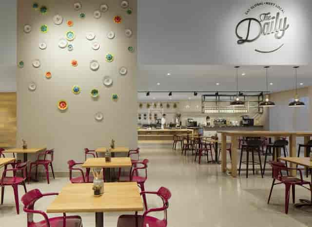 Modern coworking space at Rove JBR featuring flexible seating for networking and business events.
