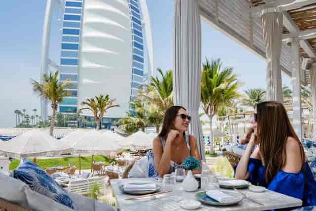 Summersalt Beach Club luxury restaurant, elegant outdoor dining for corporate networking events.