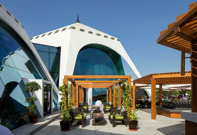 Pool Terrace lounge seating at Emirates Golf Club for upscale corporate networking events.