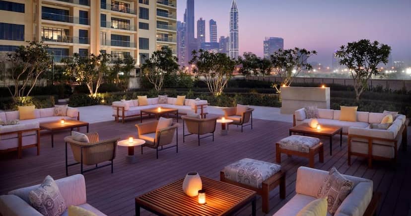 Origins open-air lounge with skyline view, ideal for corporate networking and cocktail events.