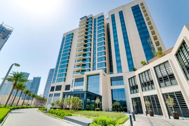 Modern hotel exterior at Vida Emirates Hills for corporate conferences and business incentive events.