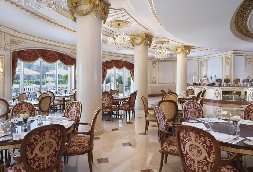Jardin Raffles banquet hall with ornate columns for upscale gala dinners and corporate events.