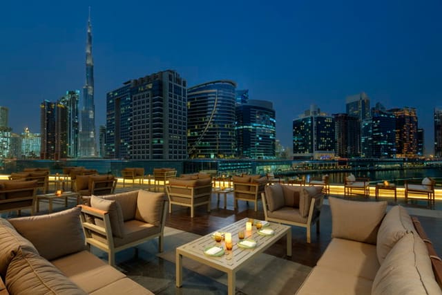 Rooftop bar in Dubai with skyline view, perfect for corporate cocktail receptions and VIP events.