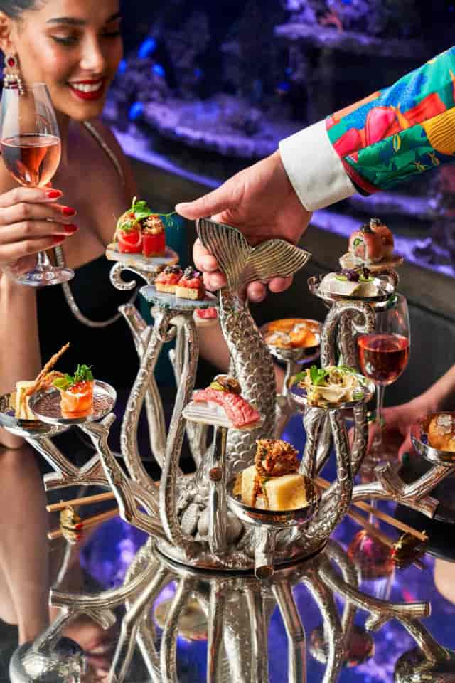 Luxury dining at Sexy Fish Dubai, immersive restaurant event venue.