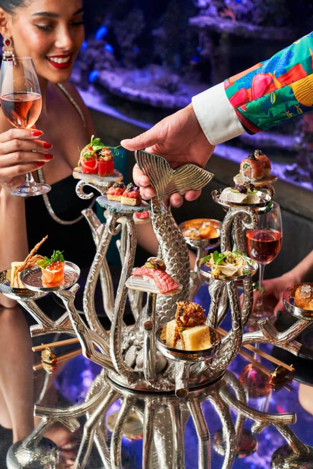 Luxury dining at Sexy Fish Dubai, immersive restaurant event venue.