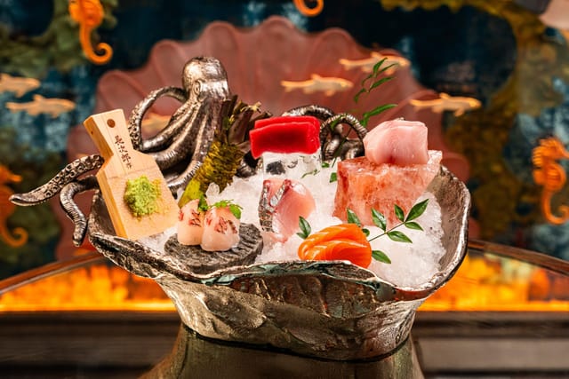 Octopus sashimi platter centerpiece at Sexy Fish Dubai, ideal for VIP receptions and gala catering.