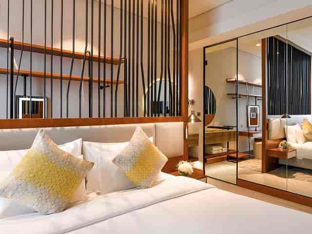 Luxury hotel room at Huzza Grand Mercure Dubai for VIP business travel and speaker accommodation.