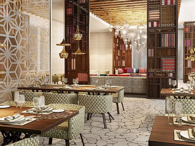Qova Café, luxury lounge in Grand Mercure Dubai City, perfect for corporate networking and VIP dining.