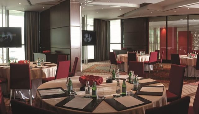 Jumeirah Creekside Hotel banquet hall with cabaret seating for corporate training and workshops.