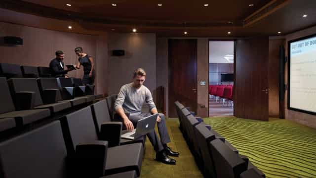 Tiered auditorium at Jumeirah Creekside Hotel for executive briefings and corporate events.
