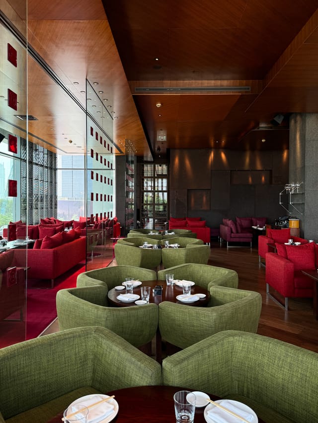Zuma Dubai dining lounge with modern decor for VIP hospitality and networking events.