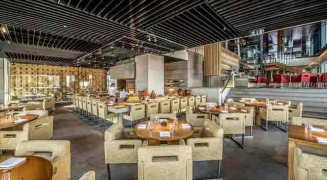 Upscale Zuma Dubai wine cellar, chef’s counter, ideal for networking receptions and gala dinners.