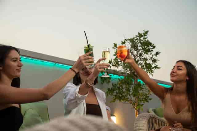 Zodiac Rooftop Lounge with ambient LED lighting for upscale cocktail hour event photography.