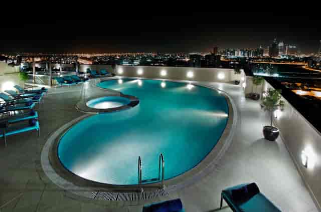 Elite Byblos Hotel rooftop venue with pool for chic cocktail receptions and VIP events.