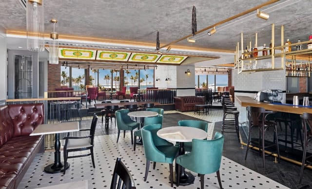 High-end lounge at JA Beach Hotel for corporate breakout sessions and networking events.