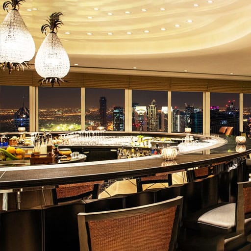Curved high-end cocktail bar at Bar 44, ideal for VIP receptions and corporate networking events.
