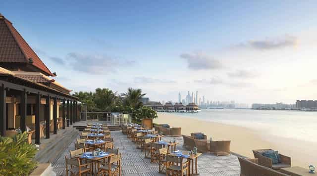 The Beach House venue at Anantara Dubai with skyline views for luxury incentive dinners.