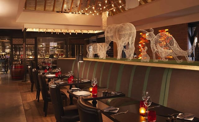 Bushman’s Restaurant interior, elegant dining, executive dinner, corporate event venue Dubai.