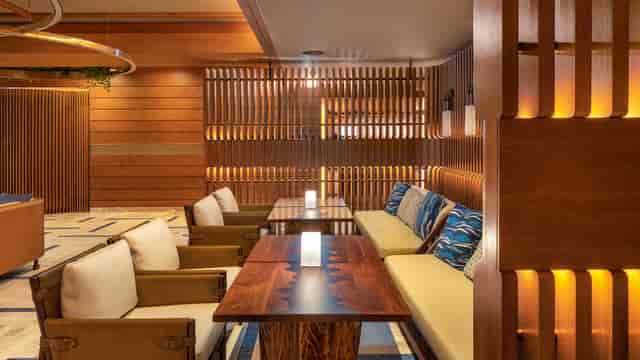 Raia Rooftop bar with natural wood decor for upscale networking events and corporate breakouts.